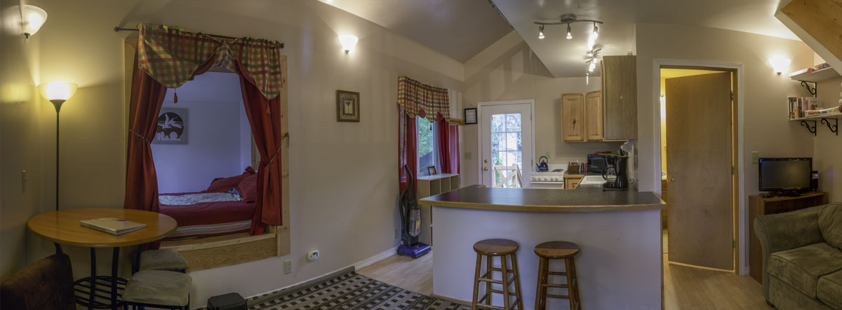 Alcove with a queen bed on the main floor.